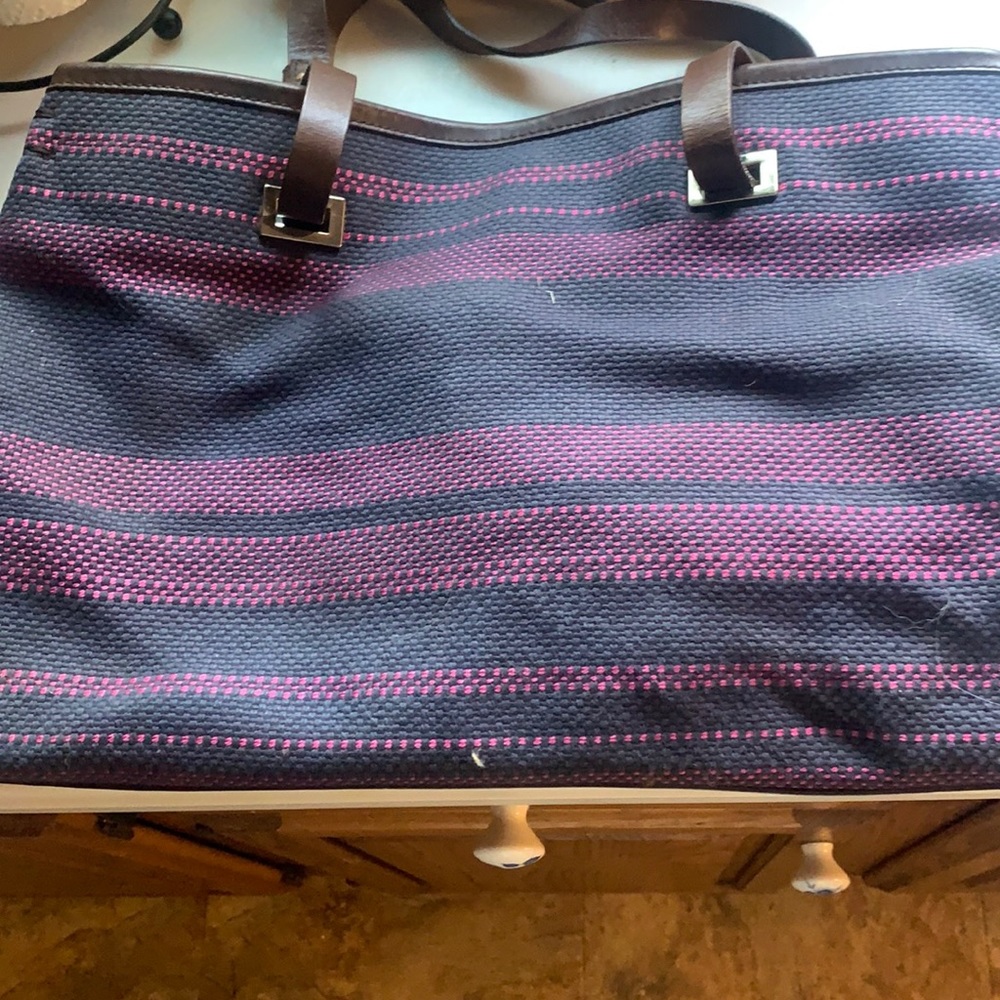 Hand bag with leather straps